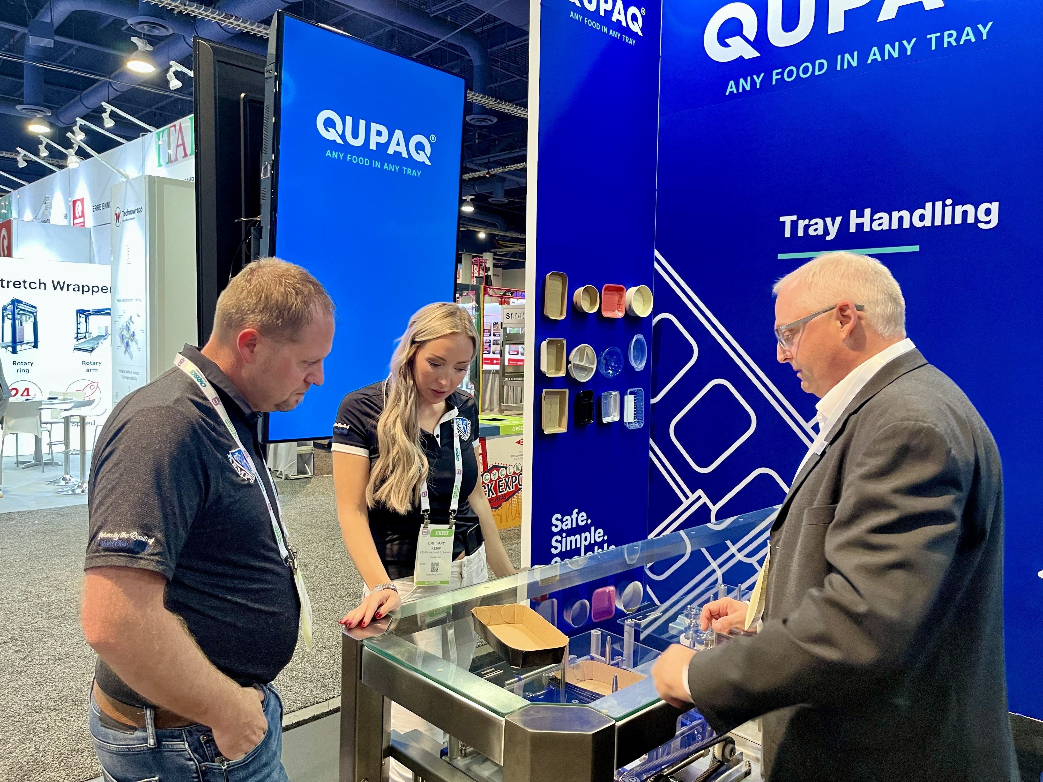 QUPAQ sales manager showing how trays are being denested