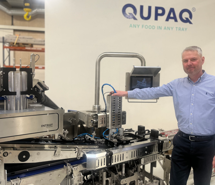 Christian Bols, CEO at QUPAQ, in front of the Lid Applicator